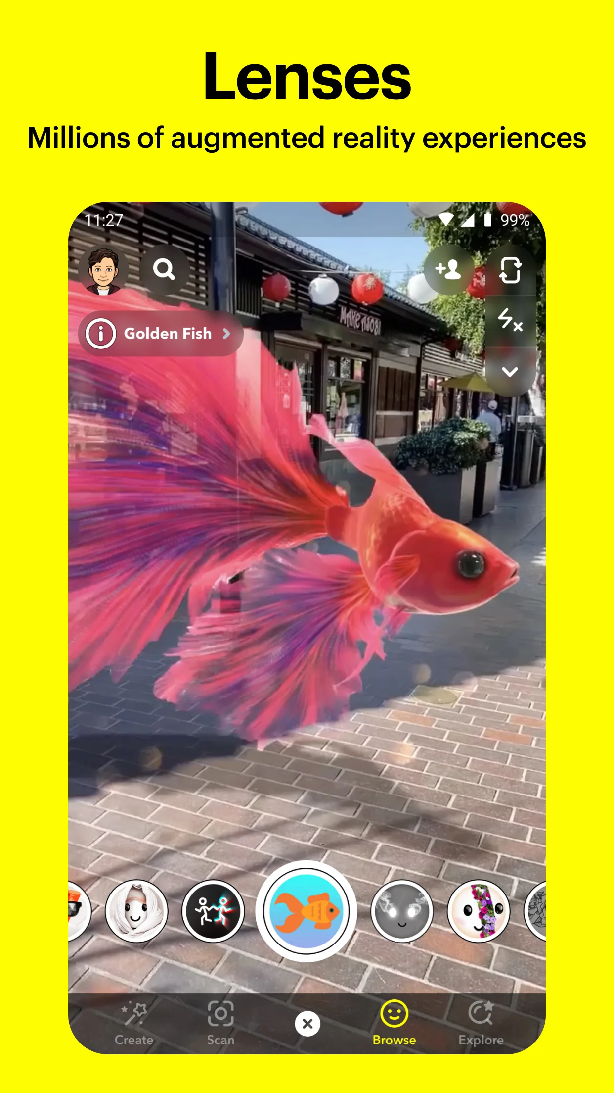 عدسة Golden Fish في صورة Snapchat الأصلية وشريط العدسات أسفل الكاميرا