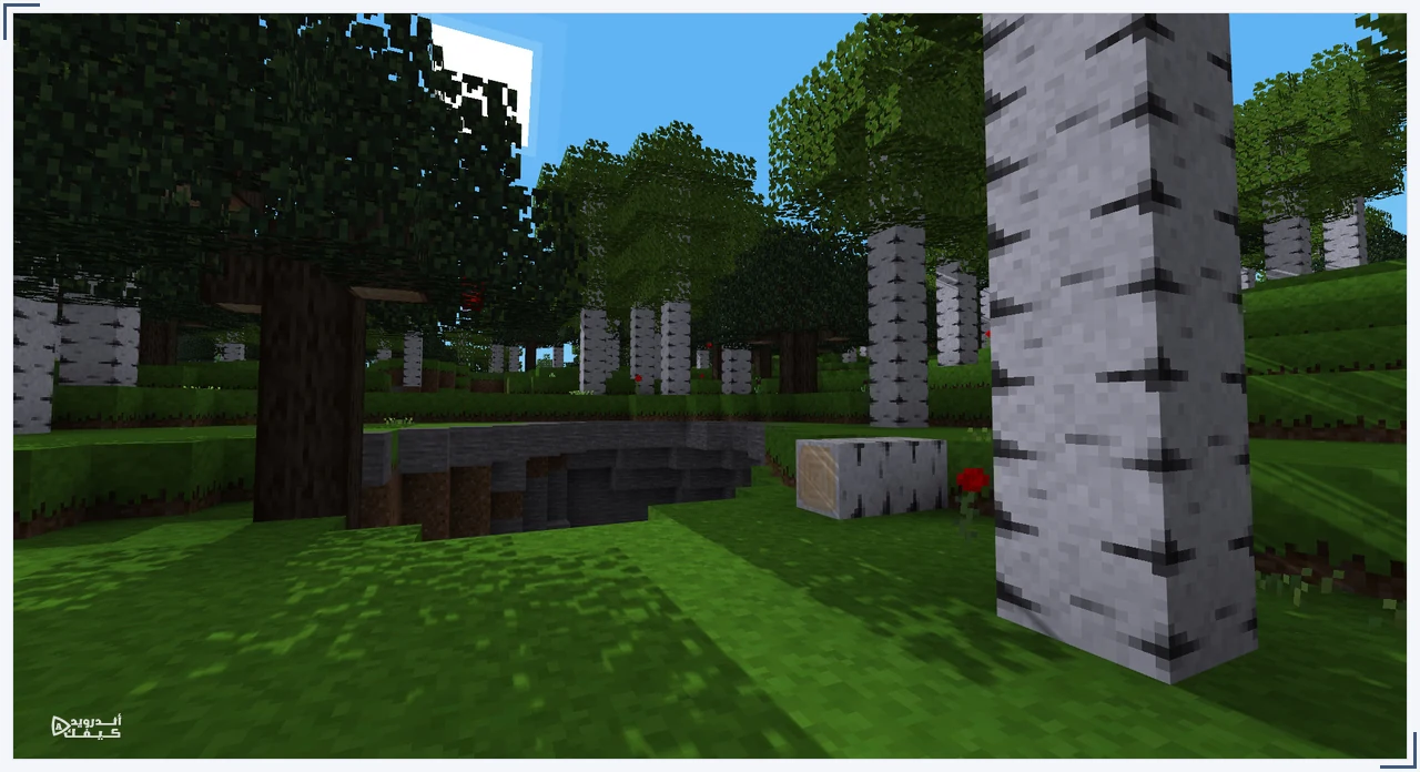 غابة مكعبة ومدخل كهف من Minetest Game كما يعرضها موقع Luanti